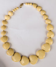 Load image into Gallery viewer, Ivory colored bead necklace principal